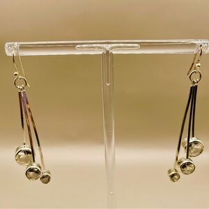 Silver tone drop dangle earrings with 3 hard strands ending with rhinestones